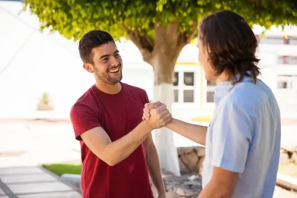 depositphotos_72580893-stock-photo-friends-greeting-each-other